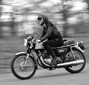 bikergirl in vintage helmet black and white