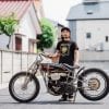 Custom Harley-Davidson motorcycle with builder on Tokyo street