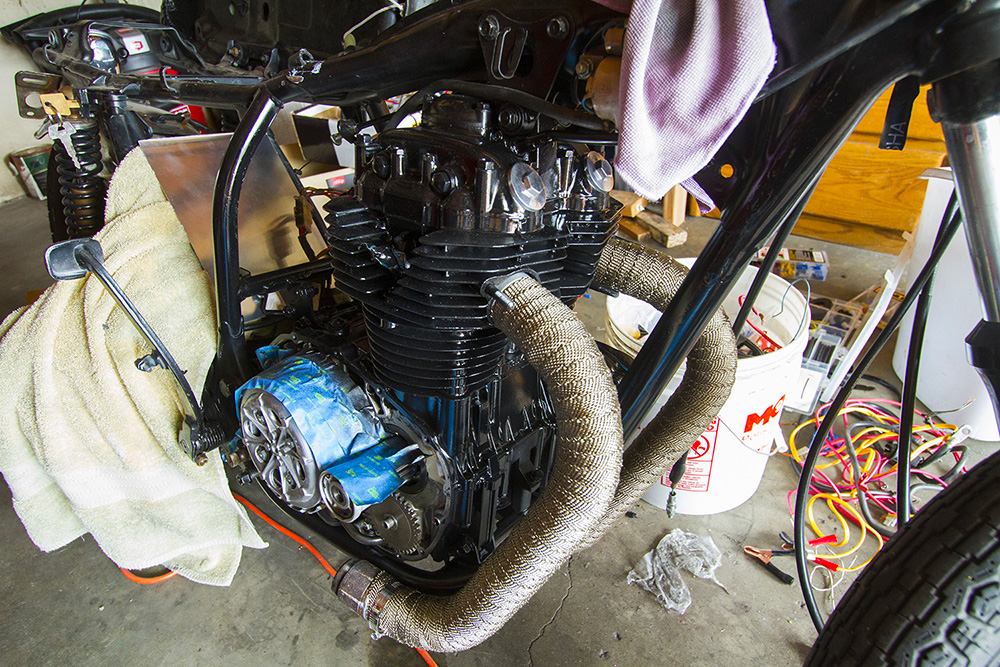 Exhaust pipes with pipe wrap on a Honda custom Motorcycle
