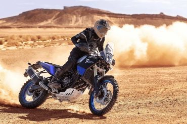 Motorcyclist on an adventure bike in the desert
