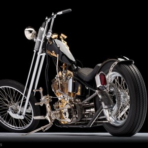 Heart of Gold, a black and gold custom built from a 1949 Harley-Davidson panhead by Les Covington in Portland, OR. Photographed by Michael Lichter at the Sacramento Easyriders Show on January 17, 2015. ©2015 Michael Lichter.