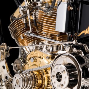 Heart of Gold, a black and gold custom built from a 1949 Harley-Davidson panhead by Les Covington in Portland, OR. Photographed by Michael Lichter at the Sacramento Easyriders Show on January 17, 2015. ©2015 Michael Lichter.